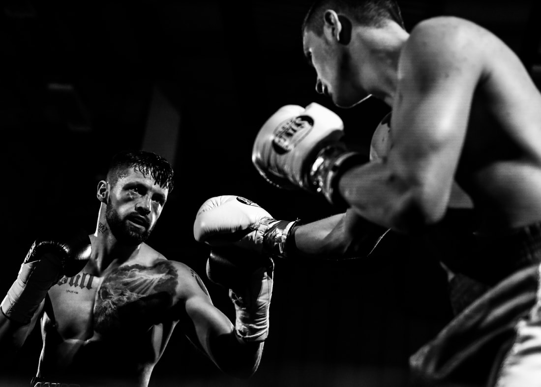 photograph of a boxing match sports event